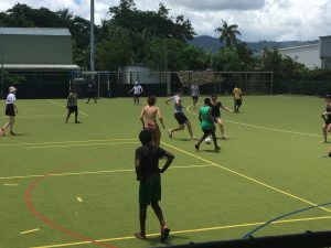 People playing soccer on a field in Vanuatu
