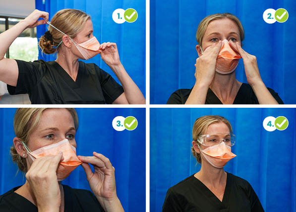 Four photos in a row. Each photo is of a nurse demonstrating how to put on a mask. From left to right, the nurse 1. Holds the mask with one hand while placing the top strap so it is resting on the top back of her head; 2. Places her fingertips from both hands on the top of the nose clip; 3. Places both hands on the outer front of the mask to ensure there is a proper seal; and 4. Selects other PPE that does not interfere with the fit of the mask.